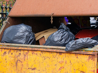 Rubbish and garbage in skip for disposal at dump site