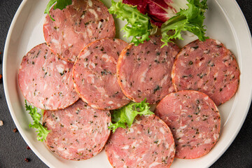 Sausage with garlic and spices slices of salami meat tasty snack fresh gourmet food background on the table rustic food top view copy space