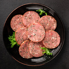 Sausage with garlic and spices slices of salami meat tasty snack fresh gourmet food background on the table rustic food top view copy space