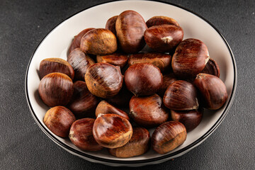 Edible chestnuts delicious treat tasty snack fresh gourmet food background on table rustic food top view copy space