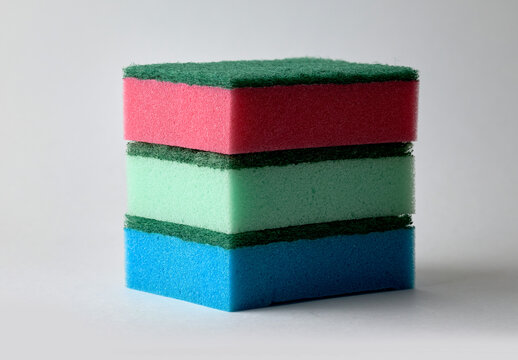 Colorful cleaning sponges stacked for household chores