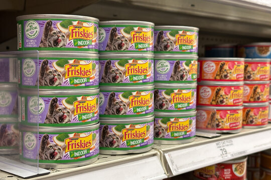 Northville, Michigan, USA - Nov 9, 2025 : Stacked cans of Friskies homestyle turkey dinner wet cat food on a grocery shelf