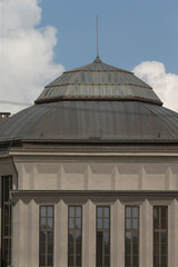 grand dome and tall windows in bright daylight, stately proportions and textured walls create strong focal