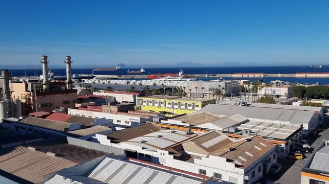 Panoramic view of Ceuta and its industrial district, with the port and Strait of Gibraltar in the background. Ceuta is an autonomous Spanish city in North Africa.