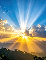 Glorious sunbeams burst through clouds over a lush, mountainous landscape at dawn