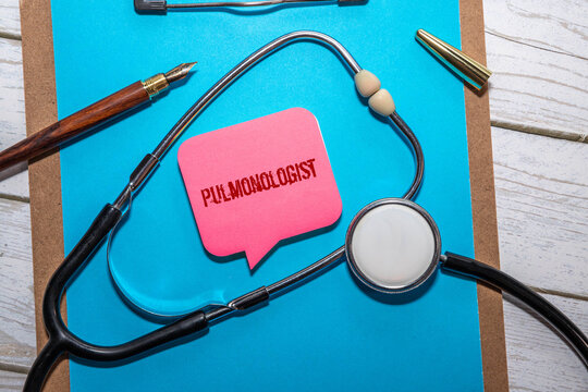 pneumologist holding tablet pc in the clinic with text pulmonologist