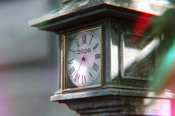 Vintage Wooden Clock with 2026 Numbers on Face Chromatic Aberration Effect Close-Up View