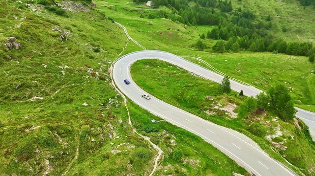 Aerial drone view of scenic road Susten Pass mountain pass in Swiss Alps in summer. Switzerland 4k.