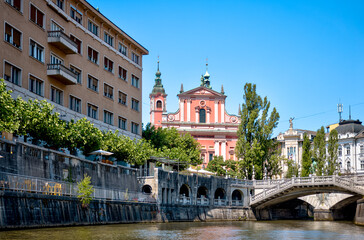 Ljubljana, Slovenia – July 14, 2025: A scenic view of the Ljubljanica River as it winds through...