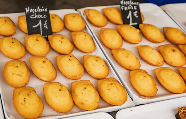 Madeleine cookies with chocolate at Cours Saleya street market in Nice, France