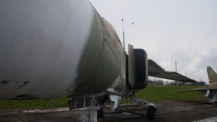 view of airplane rear section showing details, grounded aircraft focused for routine engineering checkup