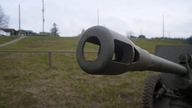 weapon barrel details, detailed view highlighting gun muzzle with modifications and textures - Powered by Adobe