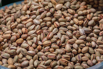 Whole pistachios in shells on display at a bazaar market stall, Istanbul, Turkey