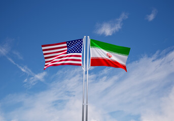 flags of iran and United States of America over blue sky background.