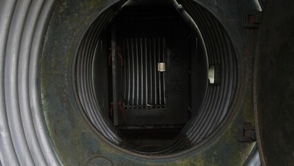 maintenance crews mapping and inspecting duct and wiring routes within aircraft fuselage engine bay