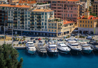 Boats and traditional houses in Lympia port, Mediterranean Sea, in Nice, France