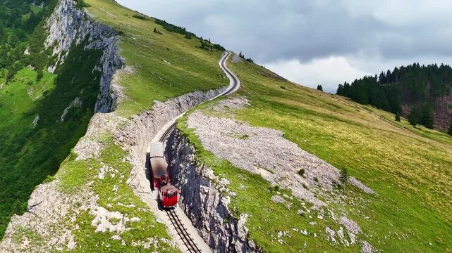 Drone Austria 4k. Schafberg Bahn, historic cog railway in Austria, it runs from St. Wolfgang up Schafberg mountain.&nbsp;popular summer travel tourism destination for hiking in Europe.