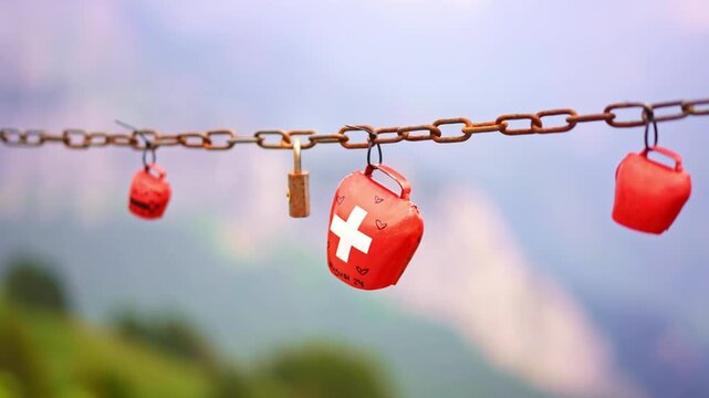 cow bells on display on Schynige Platte mountain near Interlaken. Switzerland summer, tourism hiking destination in Swiss Alps. 