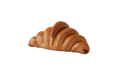 A photograph of a golden-brown croissant positioned in side view against a clean white background. The croissant displays perfectly flaky, buttery layers with a rich amber color and delicate curves th