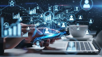 Person using a smartphone and laptop with a holographic display of interconnected data and user icons representing global communication and business analytics. - Powered by Adobe