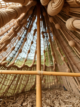 In Brilon, Germany there is a tent made of knitted wool.  It symbolizes the linking of people in a community.  Wide angle shot shows a bamboo stick, which serves as a framework.