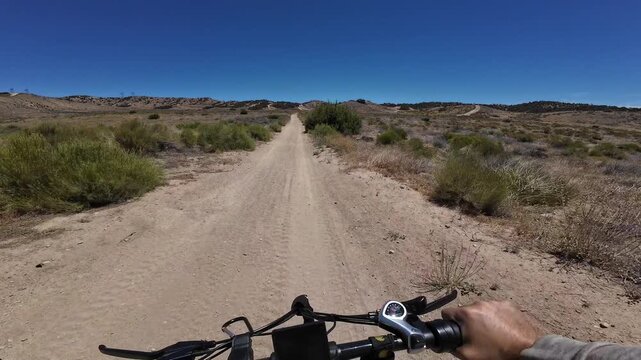 Dirt Bike and Electric Mountain Bike POV Shot of Hungry Valley CJ's Trail 2 Road Runner Trail in Southern California USA