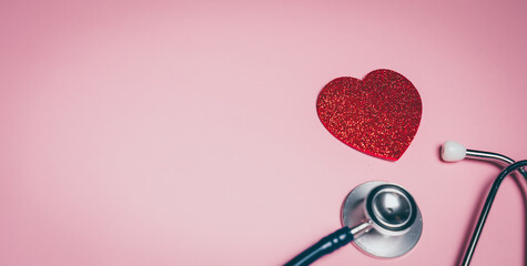 Glitter red heart with stethoscope, heart wellbeing awareness, medical prevention support, emotional health connection, wellness responsibility insight, heart checkup care concept