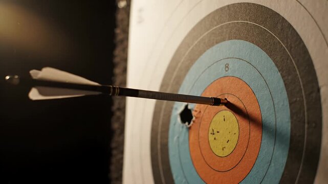 Close up of an arrow perfectly hitting an archery target showcasing precision and accuracy in target practice This successful shot represents goal achievement