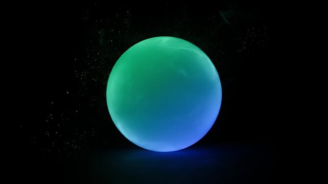 Mesmerizing Glowing Blue Green Gradient Orb with Cosmic Particles on Dark Background Abstract Futuristic Sci-Fi Energy Sphere Motion Graphics Loop
