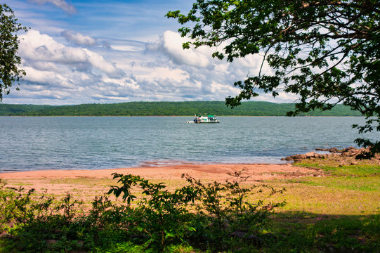 boat sailing on Lake Kariba, lake on the border between Zambia and Zimbabwe , river cruisers used for transport or tourism in the region