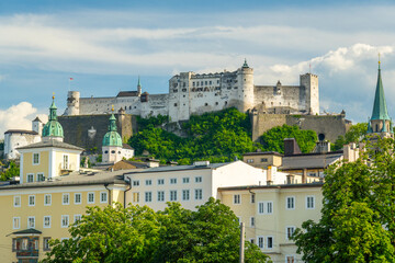 Fototapeta premium Salzburg Old Town and Hohensalzburg Fortress on Sunny Summer Day. Salzach River. Austria. Medium Shot