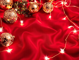 Elegant Christmas Background with Golden Ornaments on Red Silk
