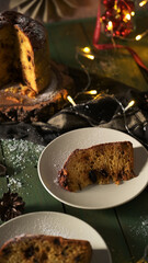 Traditional Panettone Slices and Loaf with Holiday Lights