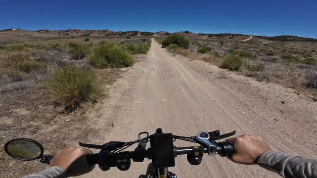 Dirt Bike and Electric Mountain Bike POV Shot of Hungry Valley CJ's Trail 4 Rattler Trail in Southern California USA