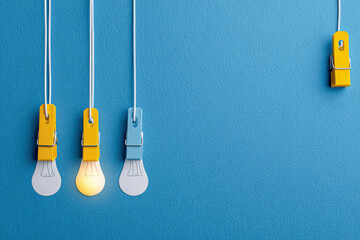 Glowing idea among suspended lightbulbs