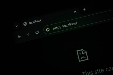 Dark-themed browser window showing a failed localhost connection, symbolizing web development errors, server testing issues, or offline site debugging by developers and programmers.