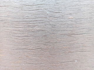 Fototapeta premium Textured Timber: A close-up showcases the intricate grain and natural patterns of aged, weathered wood, revealing a timeless texture and rustic appeal.