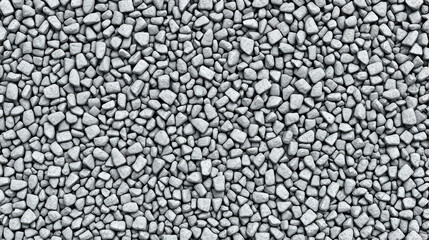 Texture of a gray macadam pile seamless background.