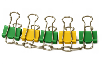 Binder clips connected by a metal chain, showing teamwork, collaboration, security, and strong working together concept