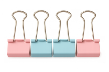 Colored binder clips row with pastel pink and blue stationery items on transparent background