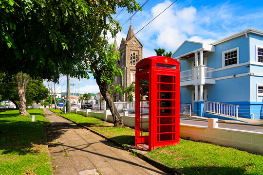 British red telephone box in front of the Immaculate Conception Co-Cathedral on Independence Square in Basseterre, St. Kitts