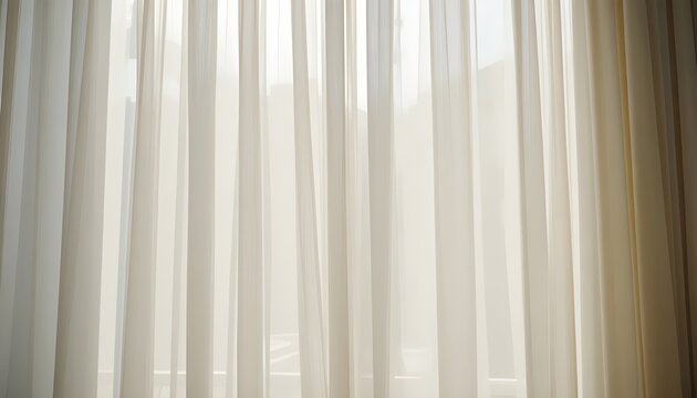 Gentle breeze moving sheer white curtains in natural light