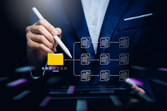 Hand managing digital document workflow, organized process mindset, structured system planning, operational clarity improvement, efficiency enhancement, file management concept