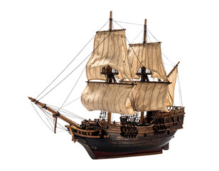 Detailed model of a black and brown sailing ship with tan sails and rigging, displayed on clean white background