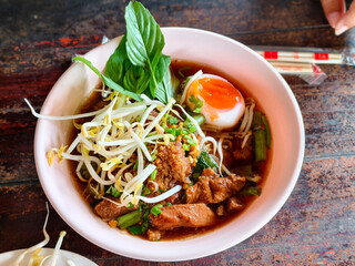 Thai Beef Noodle Soup with Soft-Boiled Egg and Fresh Herbs