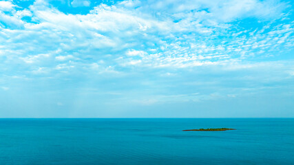 Nature of the ocean and blue sky Summer with sunshine, sandy beaches, clear blue waters sparkling...