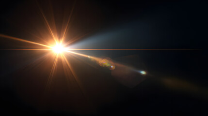 Bright lens flare effect with starburst illuminating a dark background