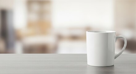 A white mug on a wooden table with a blurred kitchen background.