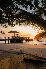 Fototapeta premium Breathtaking sunset view at Koh Kood Island, Thailand with serene beachside ambiance