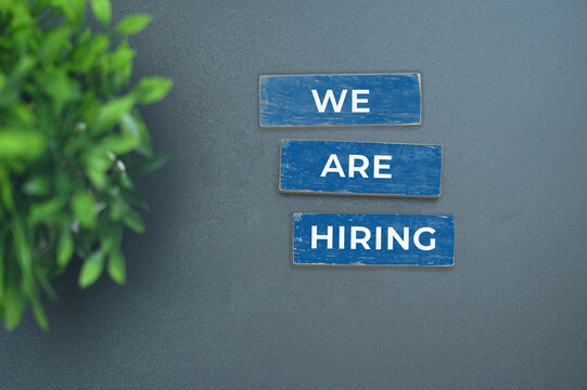 We are hiring sign on creative background for recruitment and job vacancy announcement